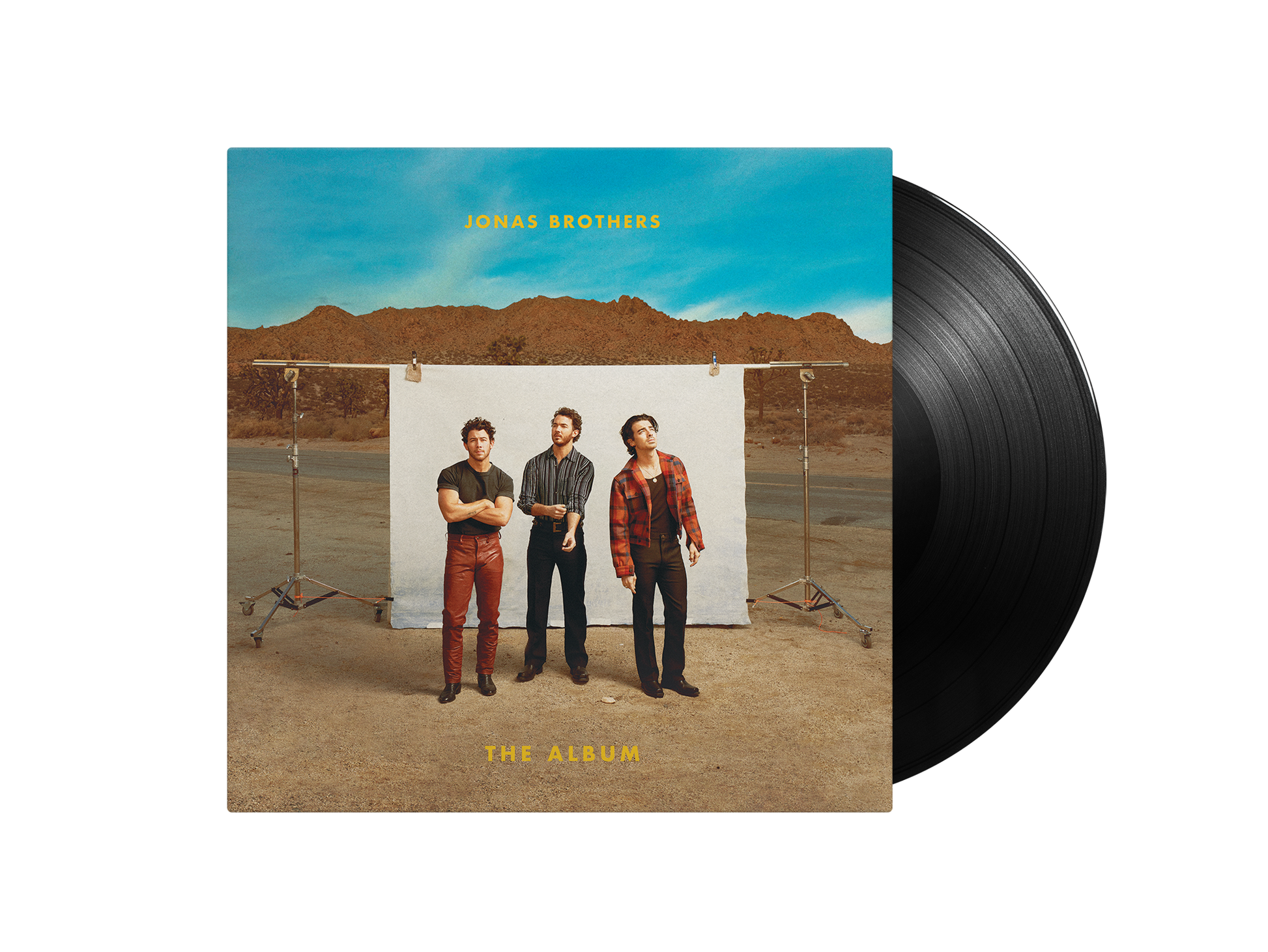 Jonas Brothers album cover with three men and a black vinyl record.
