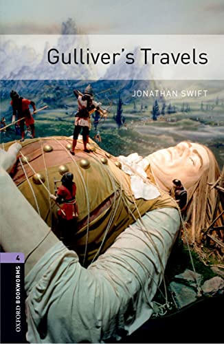 Book cover for “Gulliver’s Travels” depicting a giant tied down figure.