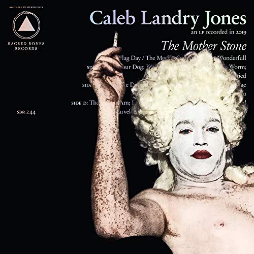 Vinyl album cover featuring a person with blonde wig and red lips.