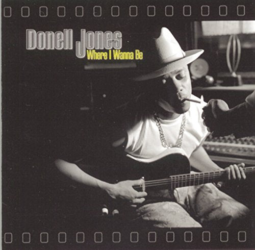 Donell Jones album cover: musician with guitar, black and white photo.