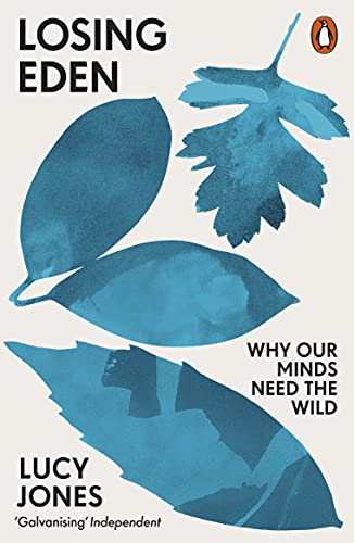 Book cover with blue leaves and the title "Losing Eden.