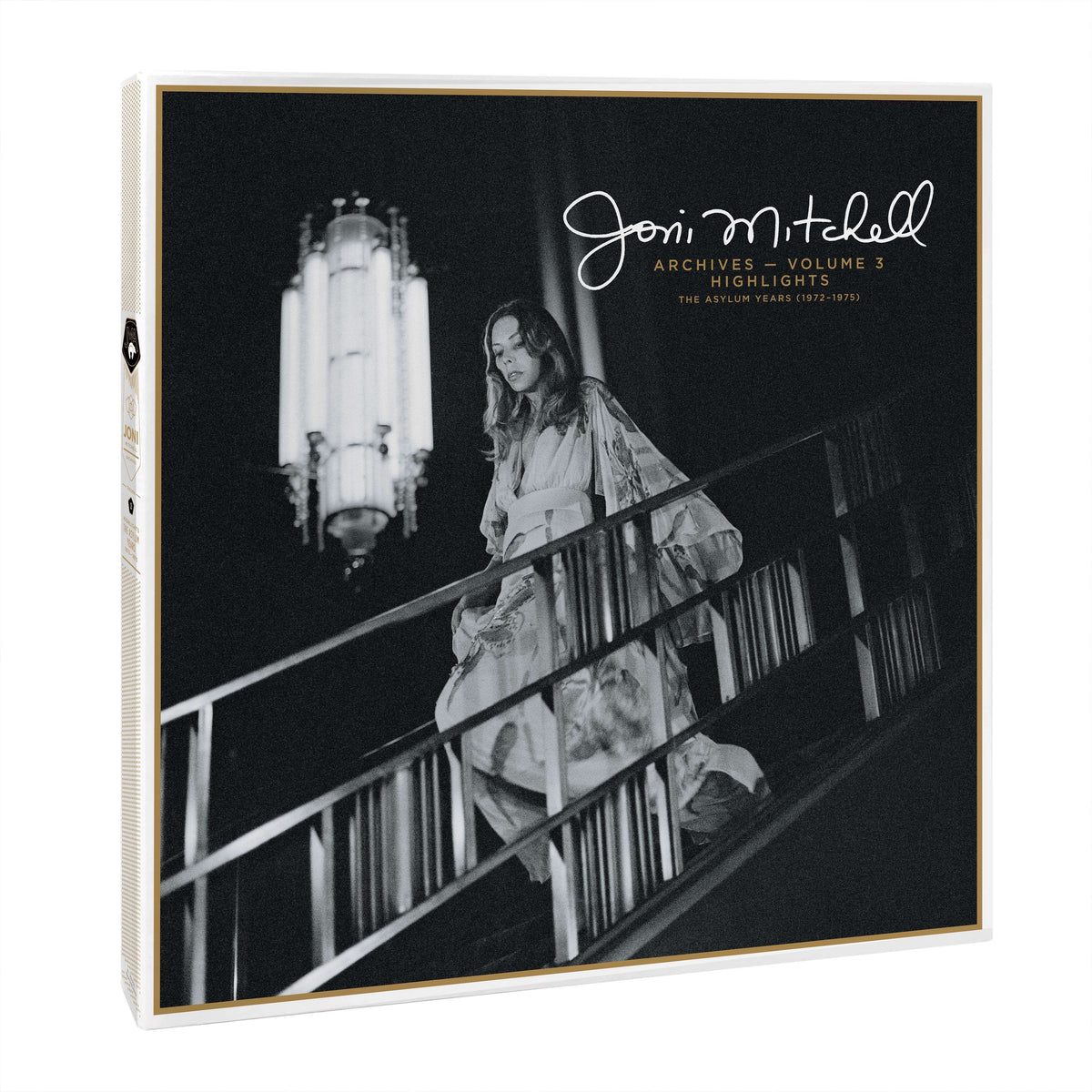 Joni Mitchell vinyl box set with black and white cover photo of Joni on staircase.