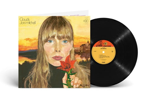 Vinyl record with cover art featuring a woman holding a red flower.
