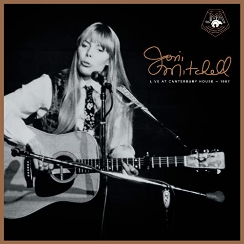 Joni Mitchell playing guitar on a vinyl record cover, 1967.