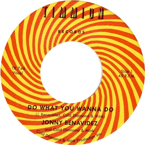 Vinyl record label with orange and yellow spiral design, text details.