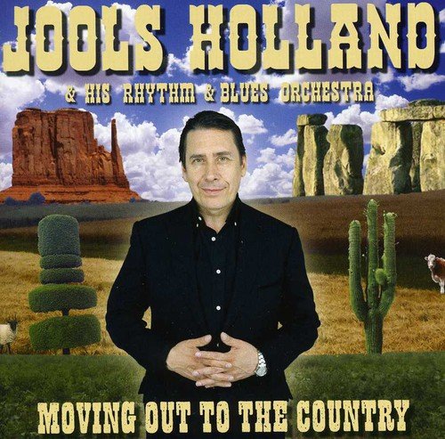 "CD cover featuring Jools Holland in a desert landscape with rock formations."
