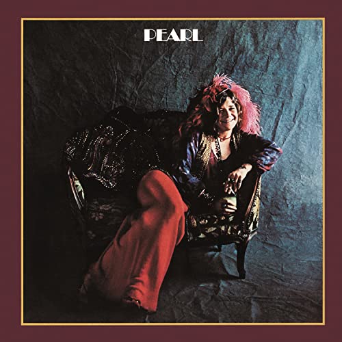 Janis Joplin album cover, "Pearl," showing her seated in a chair.