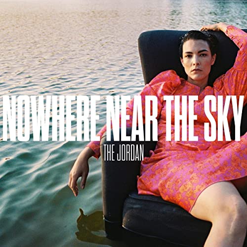 Album cover for The Jordan’s “Nowhere Near The Sky” featuring a woman in pink.