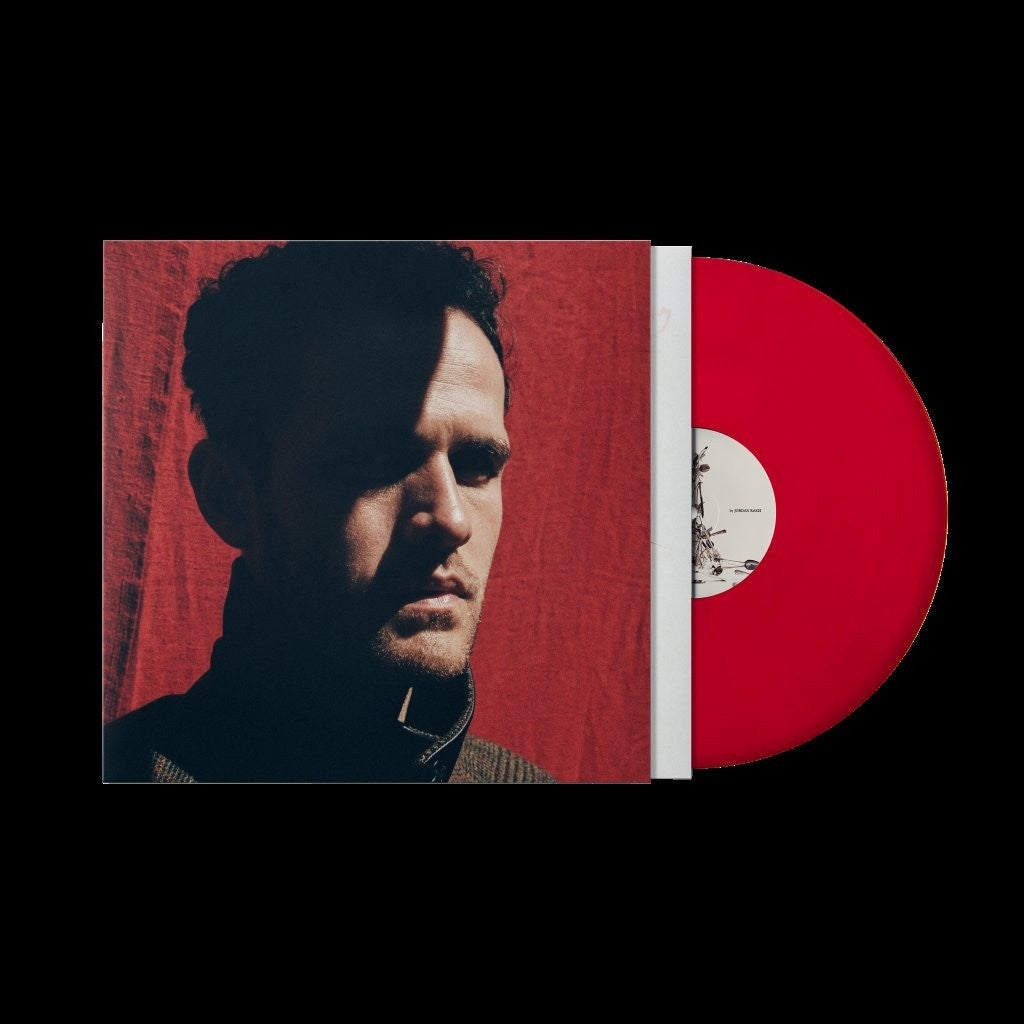Red vinyl record and album cover featuring a portrait of Jordan Rakei.