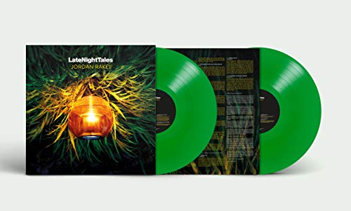 Two green vinyl records with album cover featuring a glowing lantern.