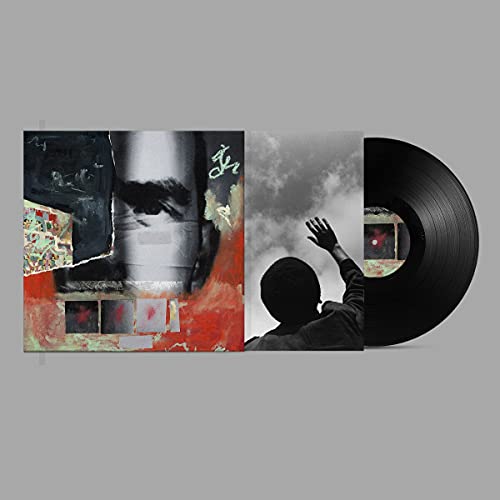 Jordan Rakei vinyl record with abstract cover art and a figure.