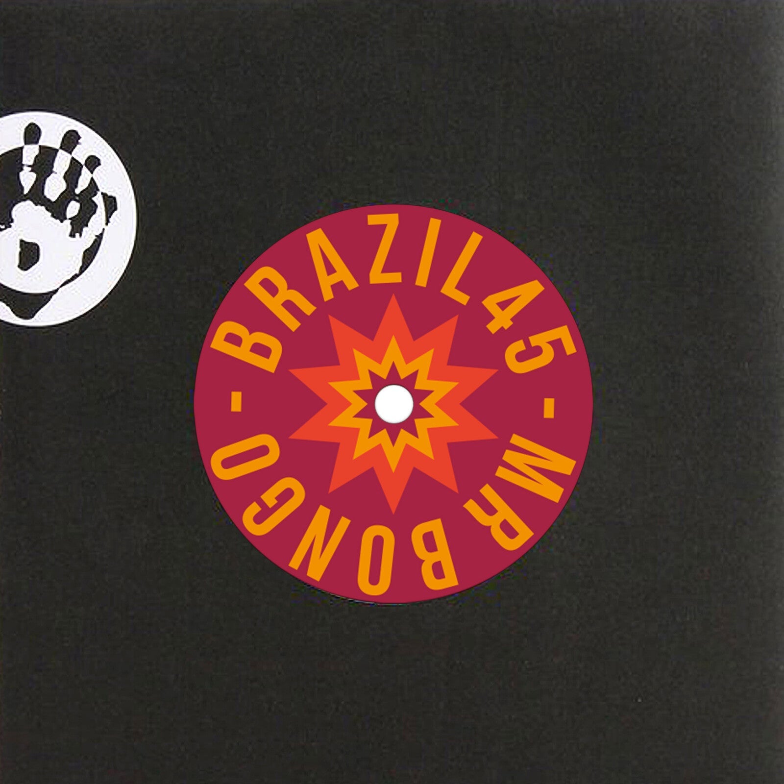 Vinyl record label with orange and red starburst design, black background.