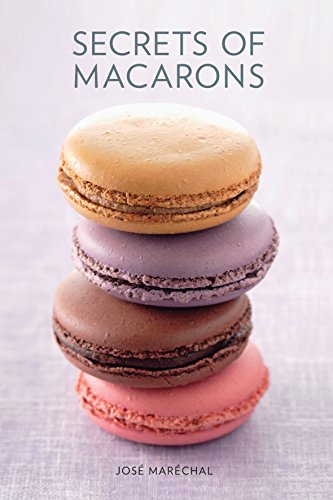 Book cover: "Secrets of Macarons" with a stack of colorful macarons.