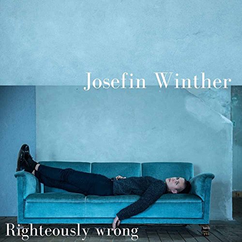 Album cover: Josefin Winther, a person lying on a blue couch.