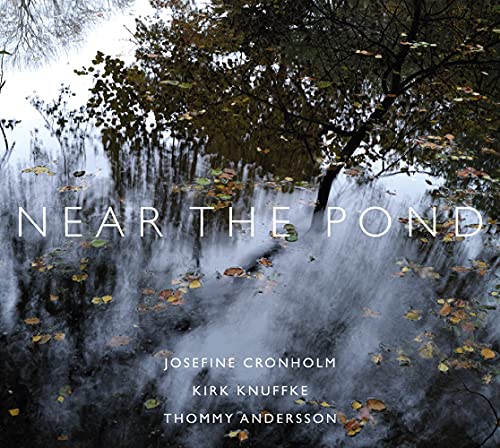 CD cover with pond reflection, trees, and album title "Near The Pond".