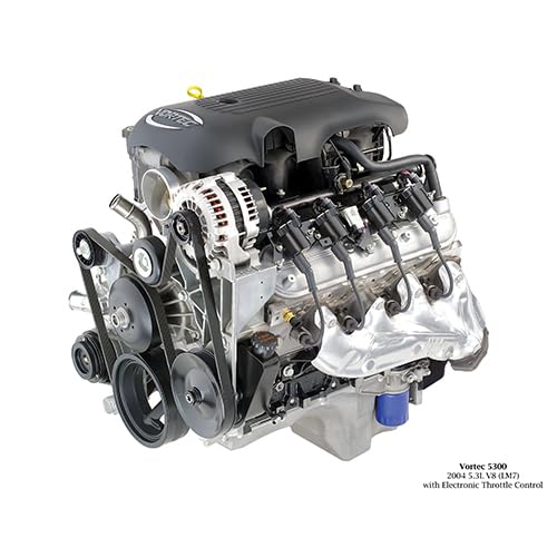 Silver V8 engine with black valve covers and various components attached.
