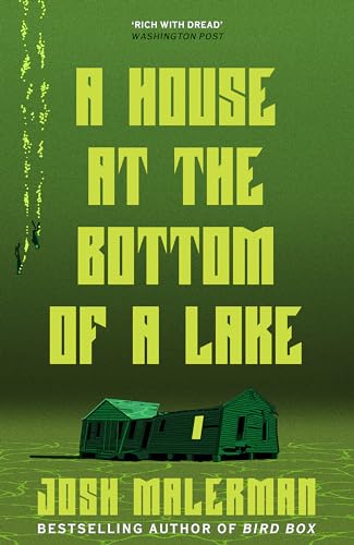 Book cover: green text, small house silhouette, dark lake water.