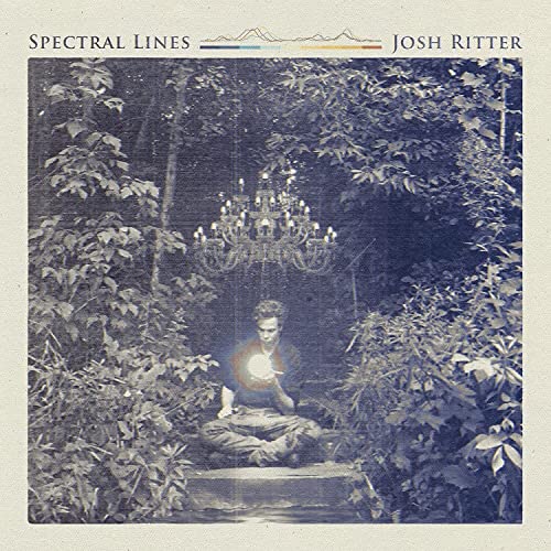 Album cover for Josh Ritter’s “Spectral Lines” featuring a chandelier in the woods.