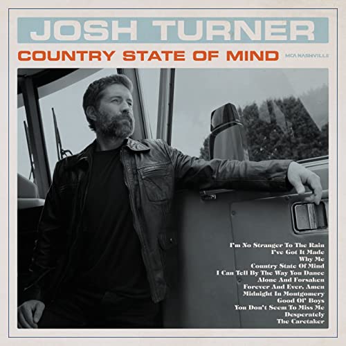 Josh Turner album cover, black and white, leaning against a vehicle.