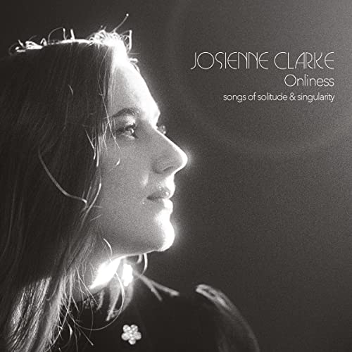 Black and white album cover featuring a woman in profile with a floral crown.