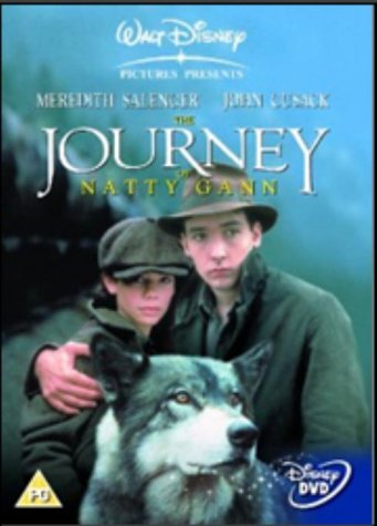 DVD cover for The Journey of Natty Gann featuring two people and a wolf.