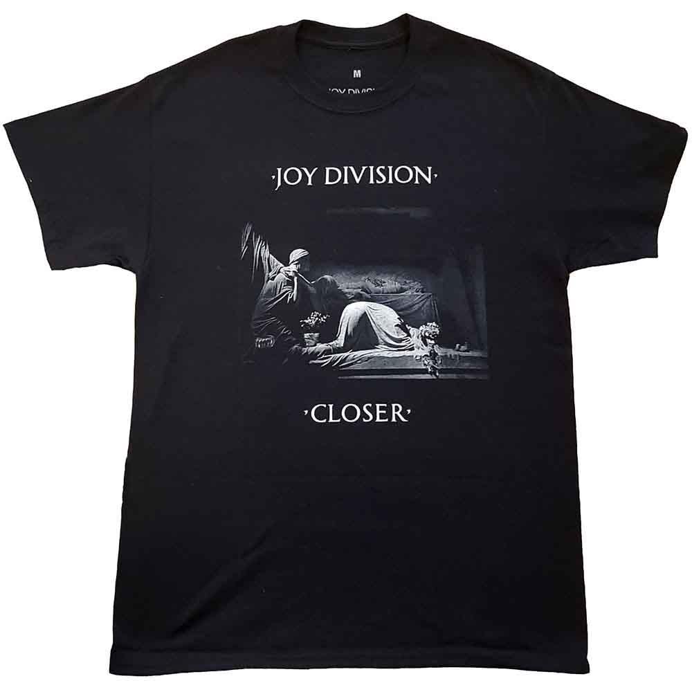 Man wearing a white Joy Division Closer t-shirt with a black and white image.