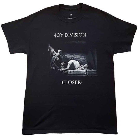 Man wearing a white Joy Division Closer t-shirt with a black and white image.