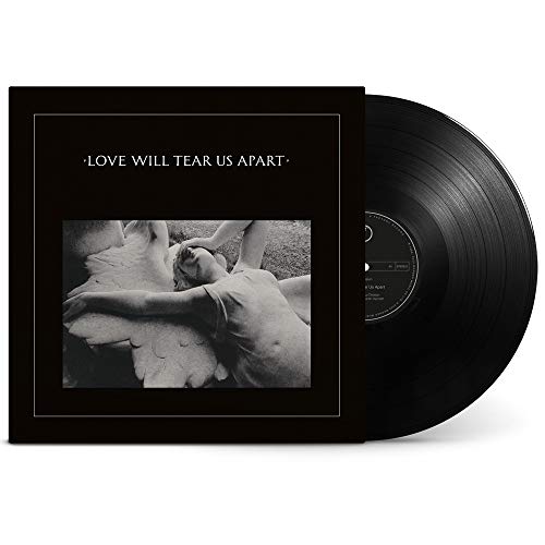 Black and white album cover featuring a person lying near a statue.