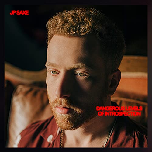 JP Saxe album cover featuring a close-up portrait of the artist.