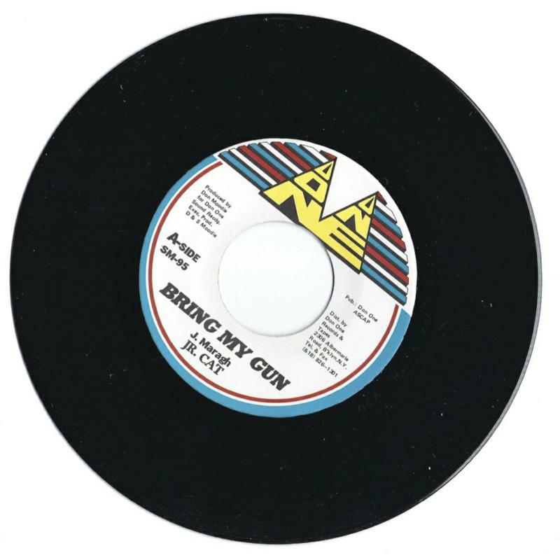 Black vinyl record label with colorful geometric design and text.