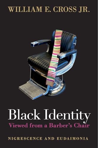 Book cover with a black barber chair and white title text.