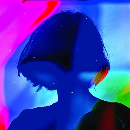 Blue silhouette of a woman’s head with colorful, blurred background.