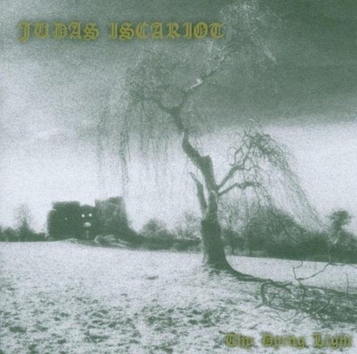 CD cover: bleak landscape with a bare tree and distant building.