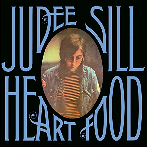 Judee Sill album cover: portrait in oval, black background, bold lettering.
