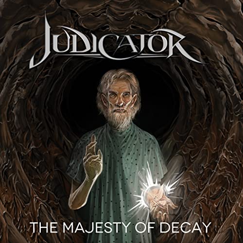CD cover art: elderly man with glowing orb, dark cavern background.
