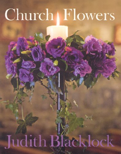 Book cover showing a candle surrounded by purple flowers on a stand.