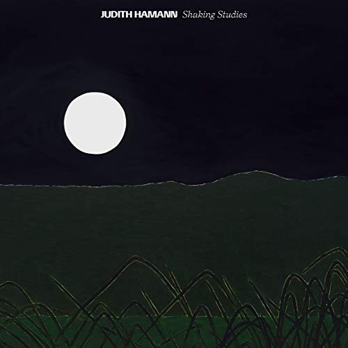 Album cover: dark landscape with a full moon and tall grass.
