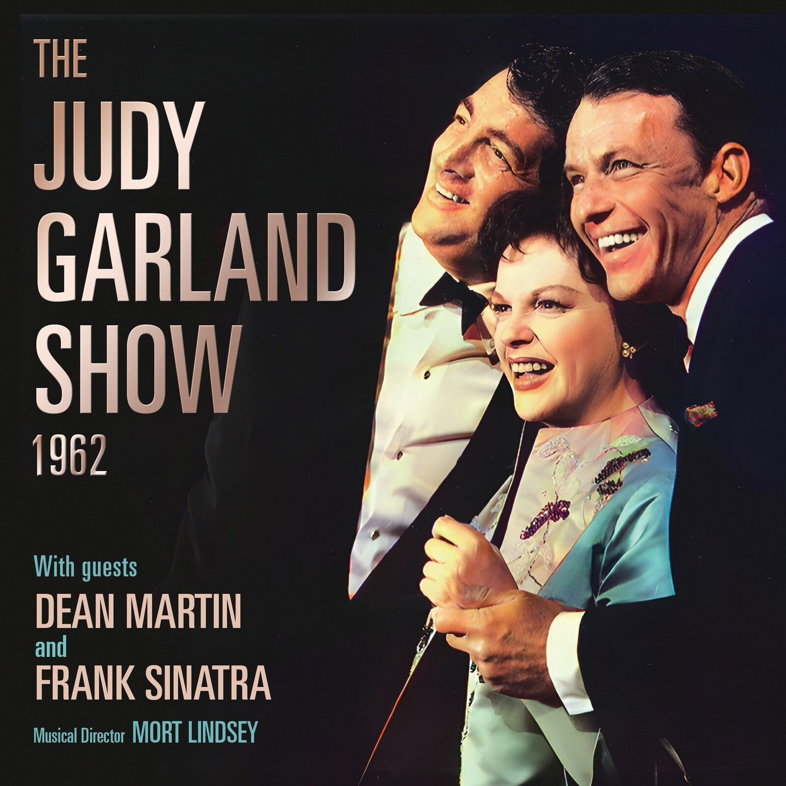 Judy Garland, Dean Martin, and Frank Sinatra smiling together on a dark background.