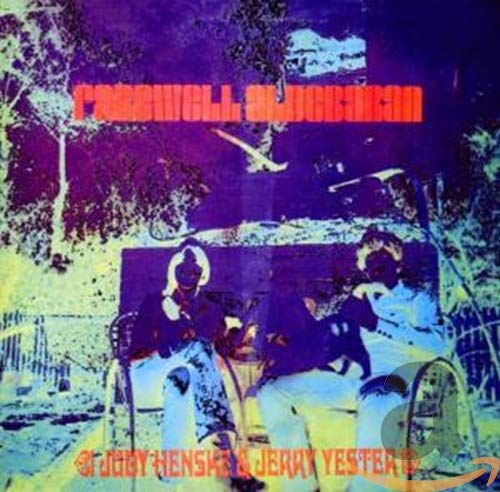 Album cover: two figures on a wagon, purple and blue tones.