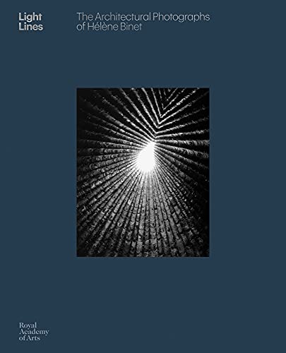 Book cover with dark blue background and a black and white architectural photograph.