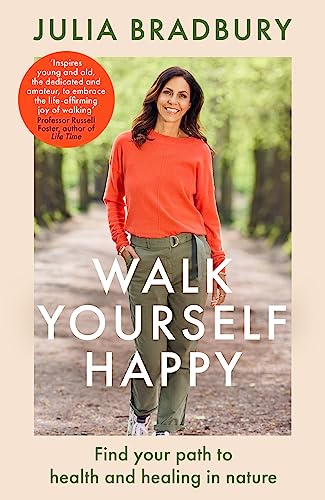 Book cover: woman in red sweater on a woodland path, title “Walk Yourself Happy”.