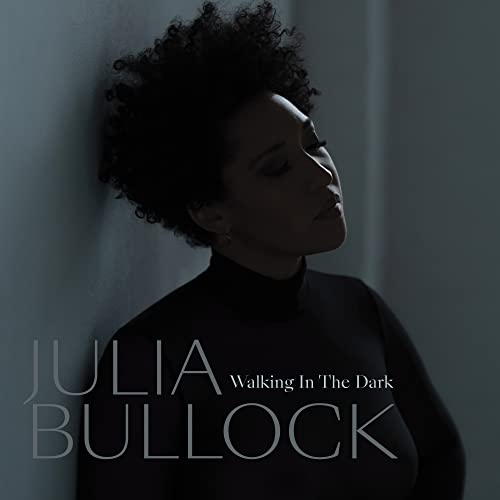 Close-up portrait of Julia Bullock with album title text overlay.