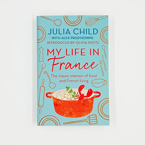 Book cover for My Life in France by Julia Child featuring kitchen utensil illustrations.