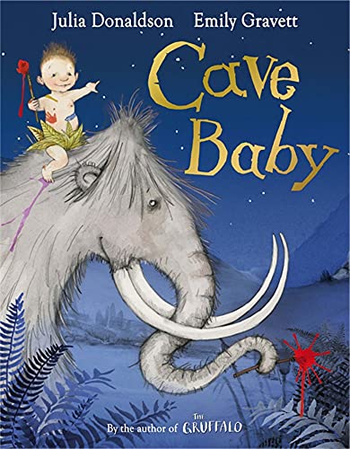 A cave baby sits on the back of a large woolly mammoth at night.