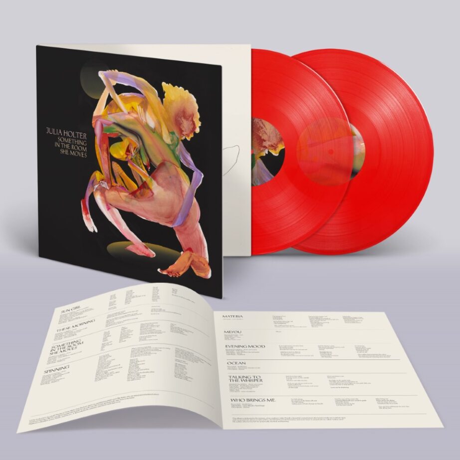 Julia Holter vinyl record with colorful cover art and two red discs.