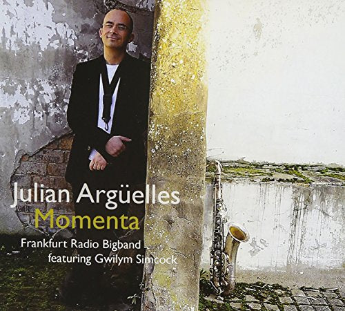 Album cover featuring a man in a black suit standing by a worn concrete pillar.