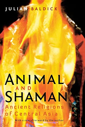 Book cover: face framed by flames, title “Animal and Shaman.”