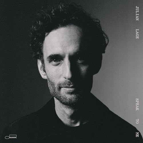 Black and white portrait of Julian Lage with album title text on the right.