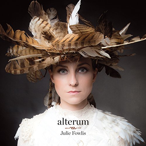"Julie Fowlis album cover featuring a woman in white with a feathered headdress."