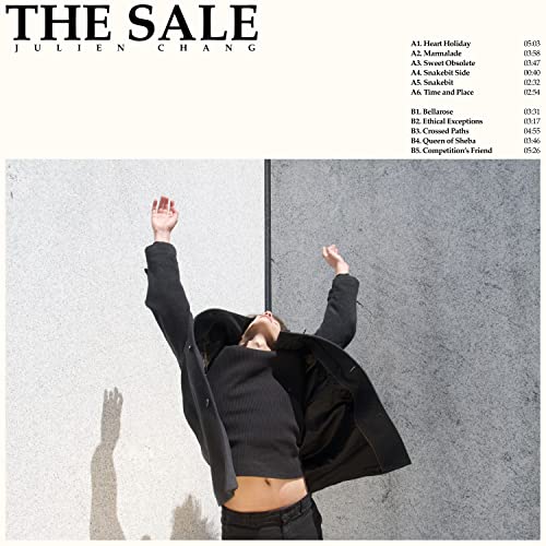 CD cover for Julien Chang’s “The Sale” featuring a person with arms raised.